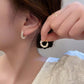 Elsa Pearl Twist Hoops