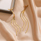 Evangeline Flowing Fringe Earrings