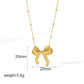 Beaded Bow Pendant Necklace in Gold