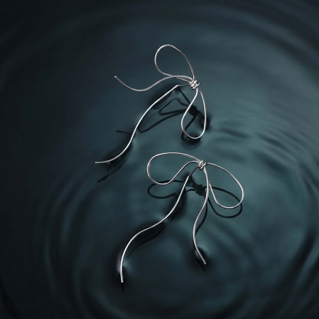 Lyra's Graceful Bow Wire Earrings