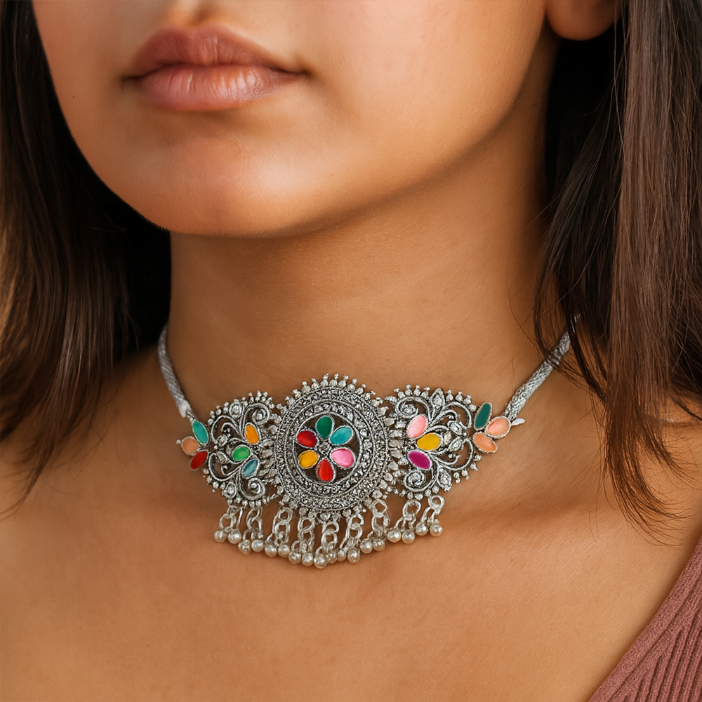 Close-up of a woman wearing an ornate necklaces for women with colorful stones.