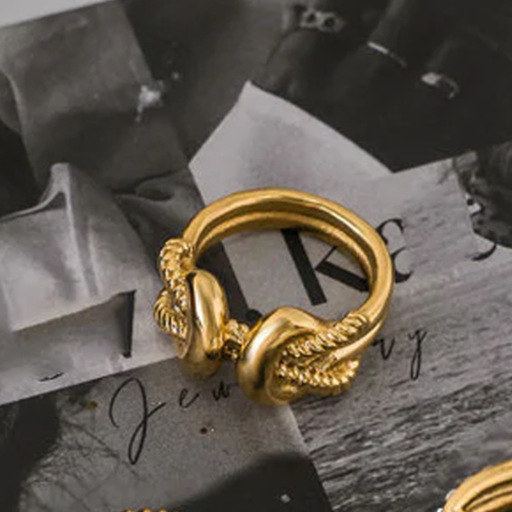 stylish gold knot ring with modern design for daily wear women