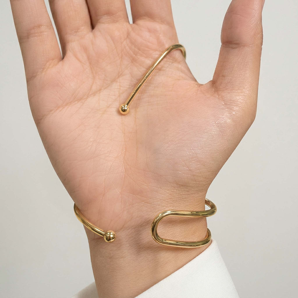 Modern gold bangle bracelet for women