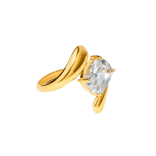 Gold ring with a large diamond on a white background