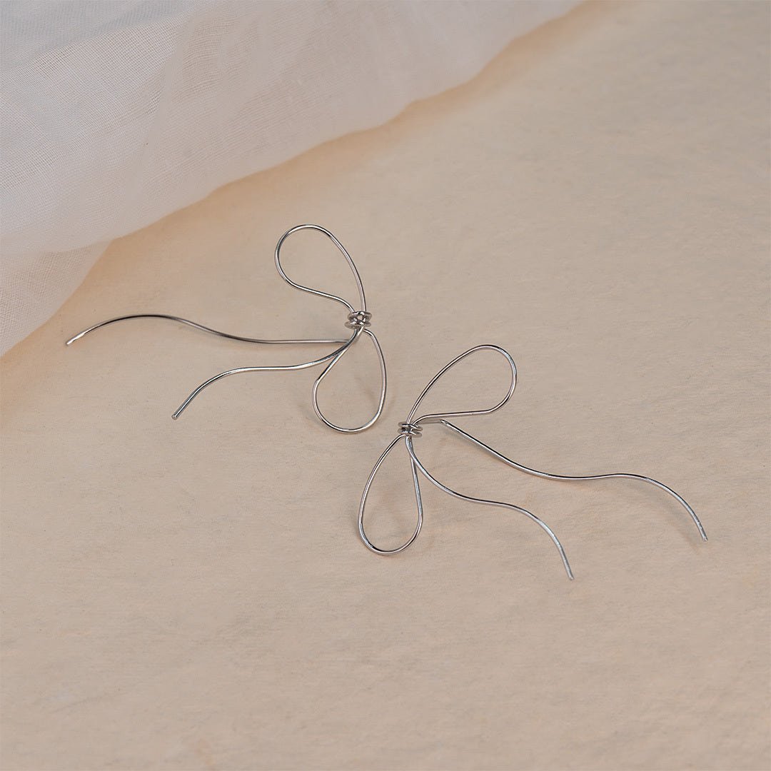 Lyra's Graceful Bow Wire Earrings