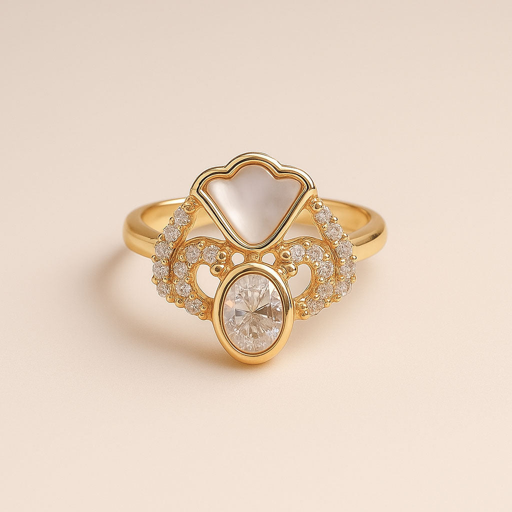 Gold ring with diamond on a beige background